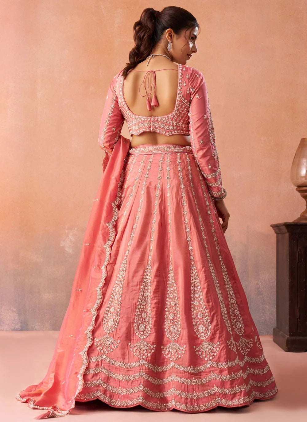 Peach floral embroidered tissue lehenga for wedding celebrations