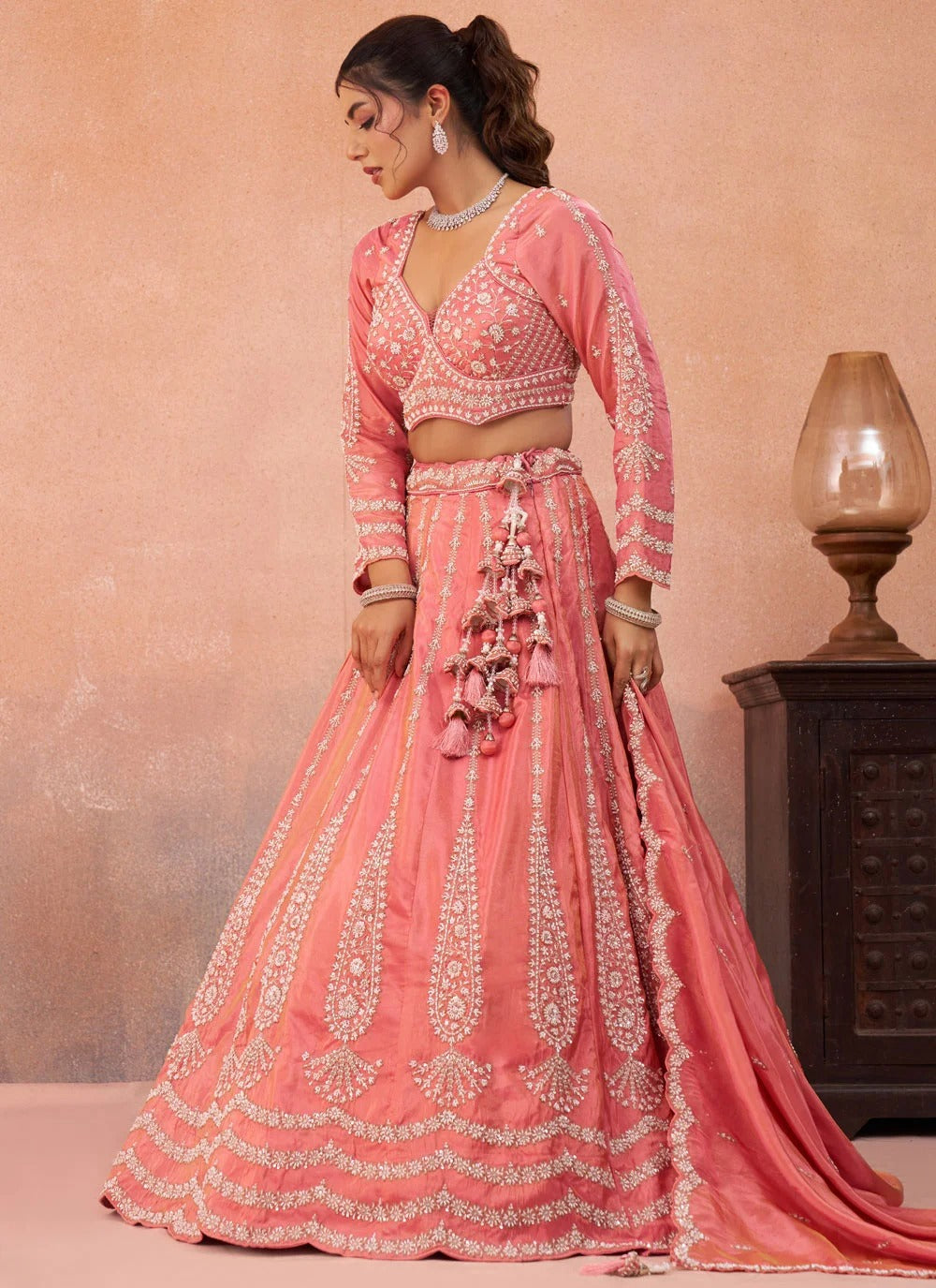 Peach floral embroidered tissue lehenga for wedding celebrations