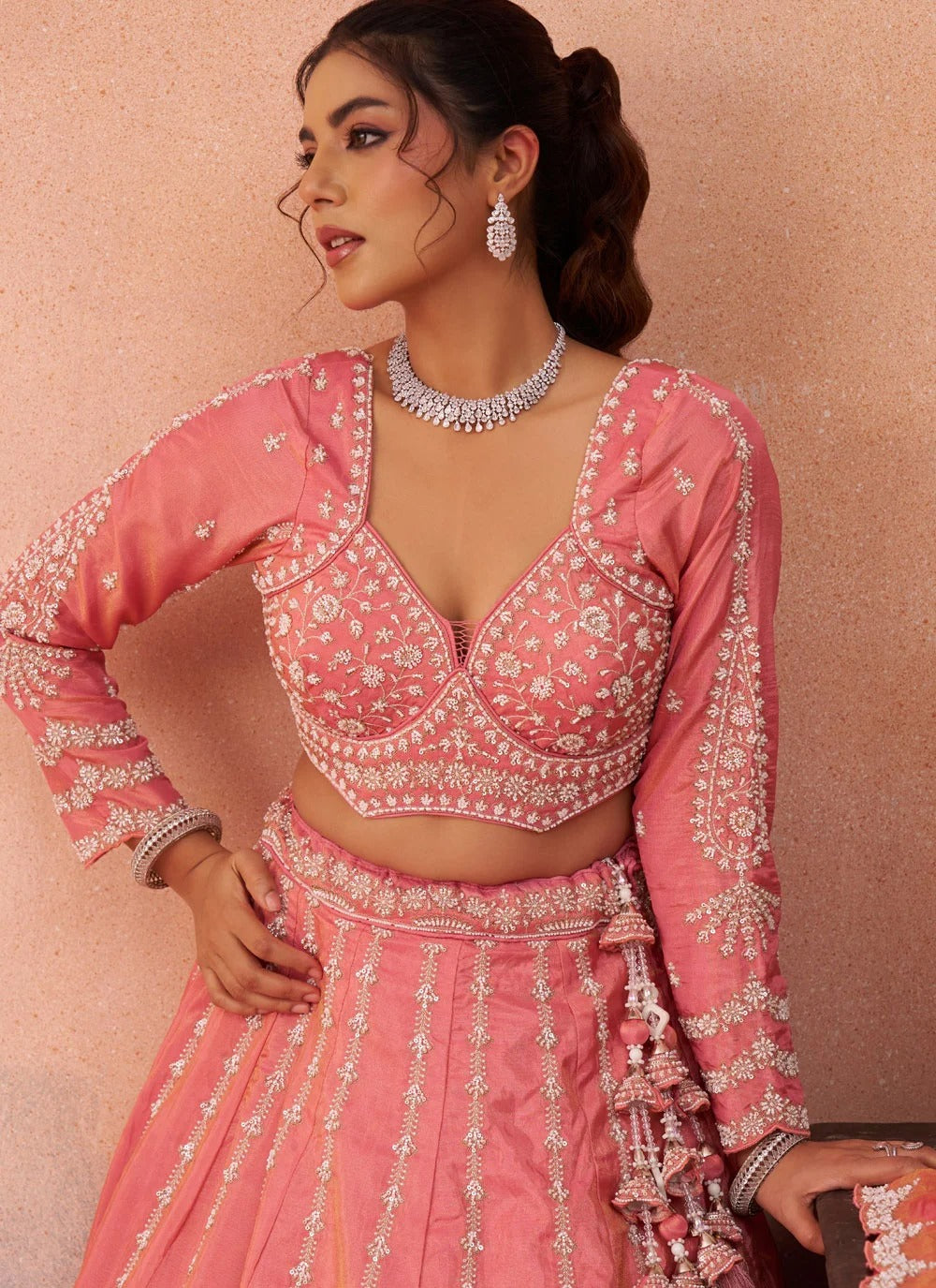 Peach floral embroidered tissue lehenga for wedding celebrations