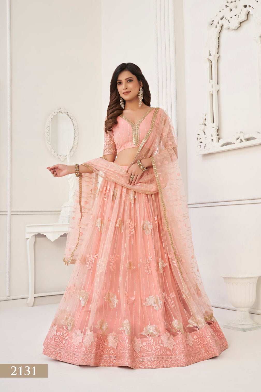 Peach Graceful Butterfly Net Lehenga Set with Tone-to-Tone Embroidery