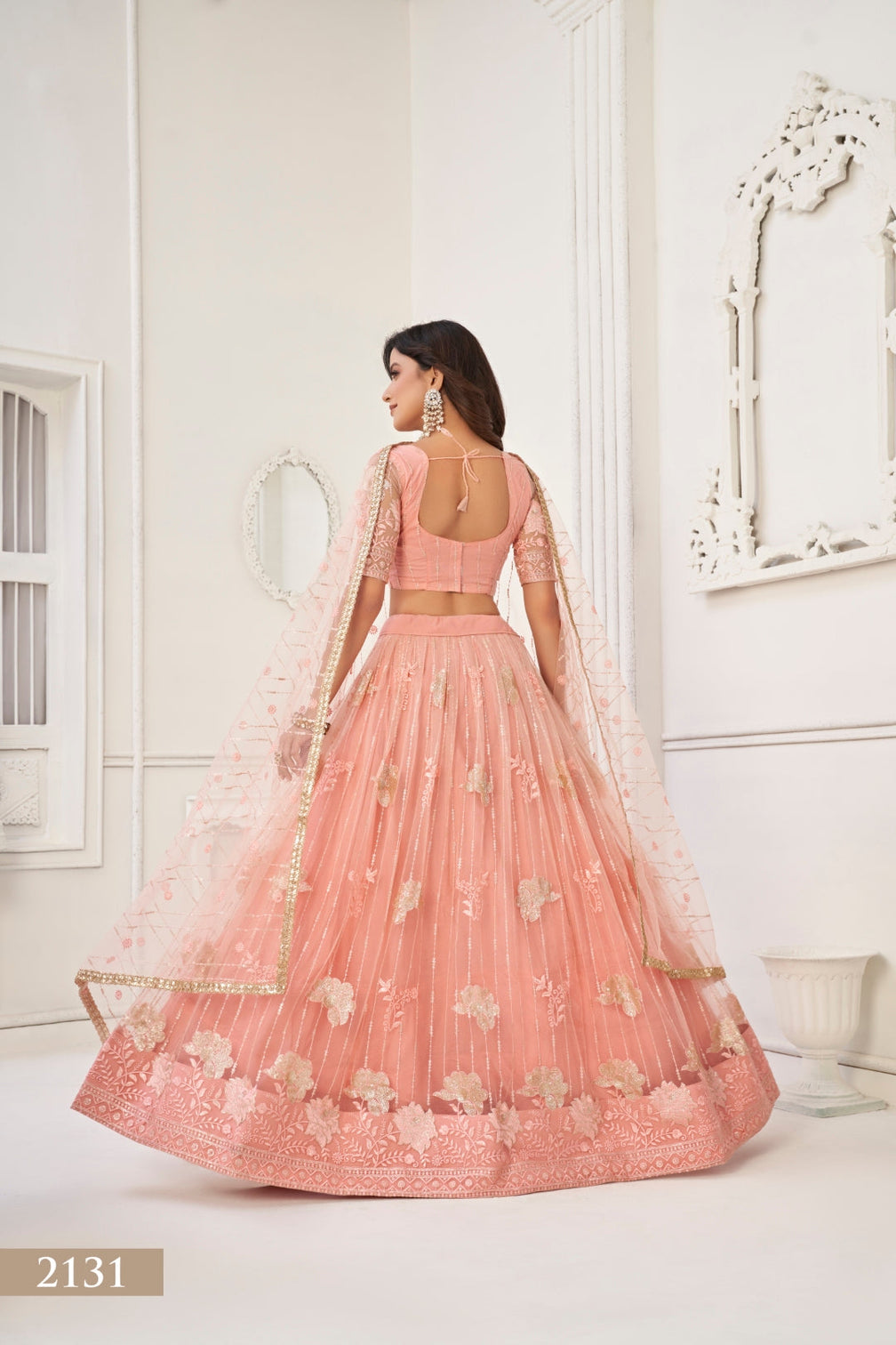 Peach Graceful Butterfly Net Lehenga Set with Tone-to-Tone Embroidery