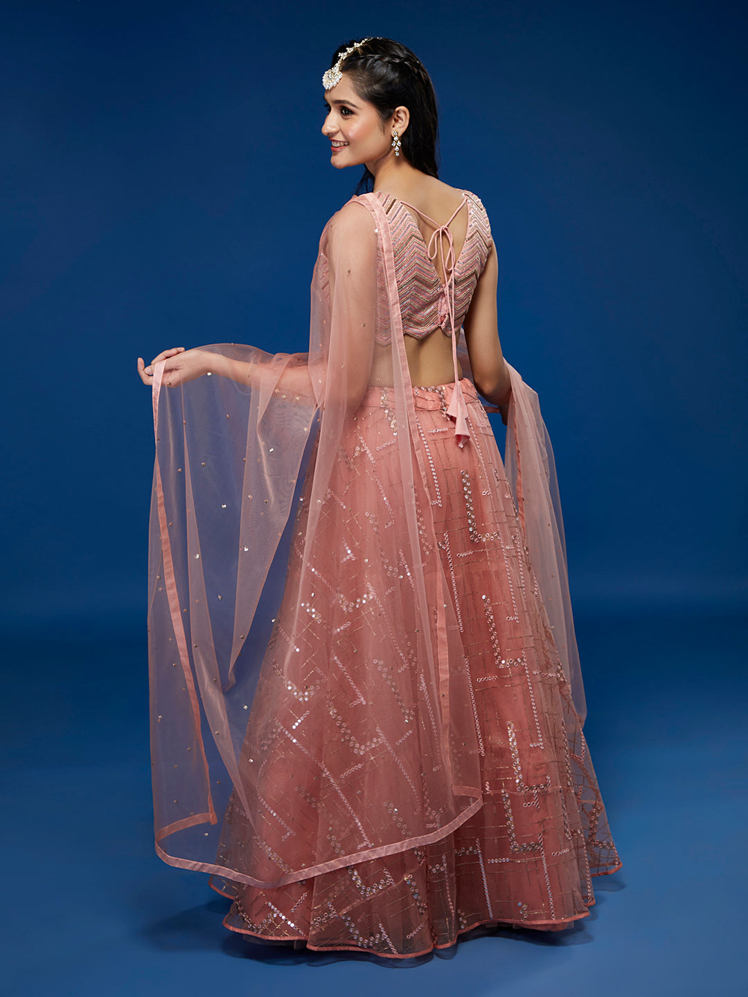 Peach Net Sequinse Embroidered Semi-Stitched Lehenga & Blouse with Dupatta