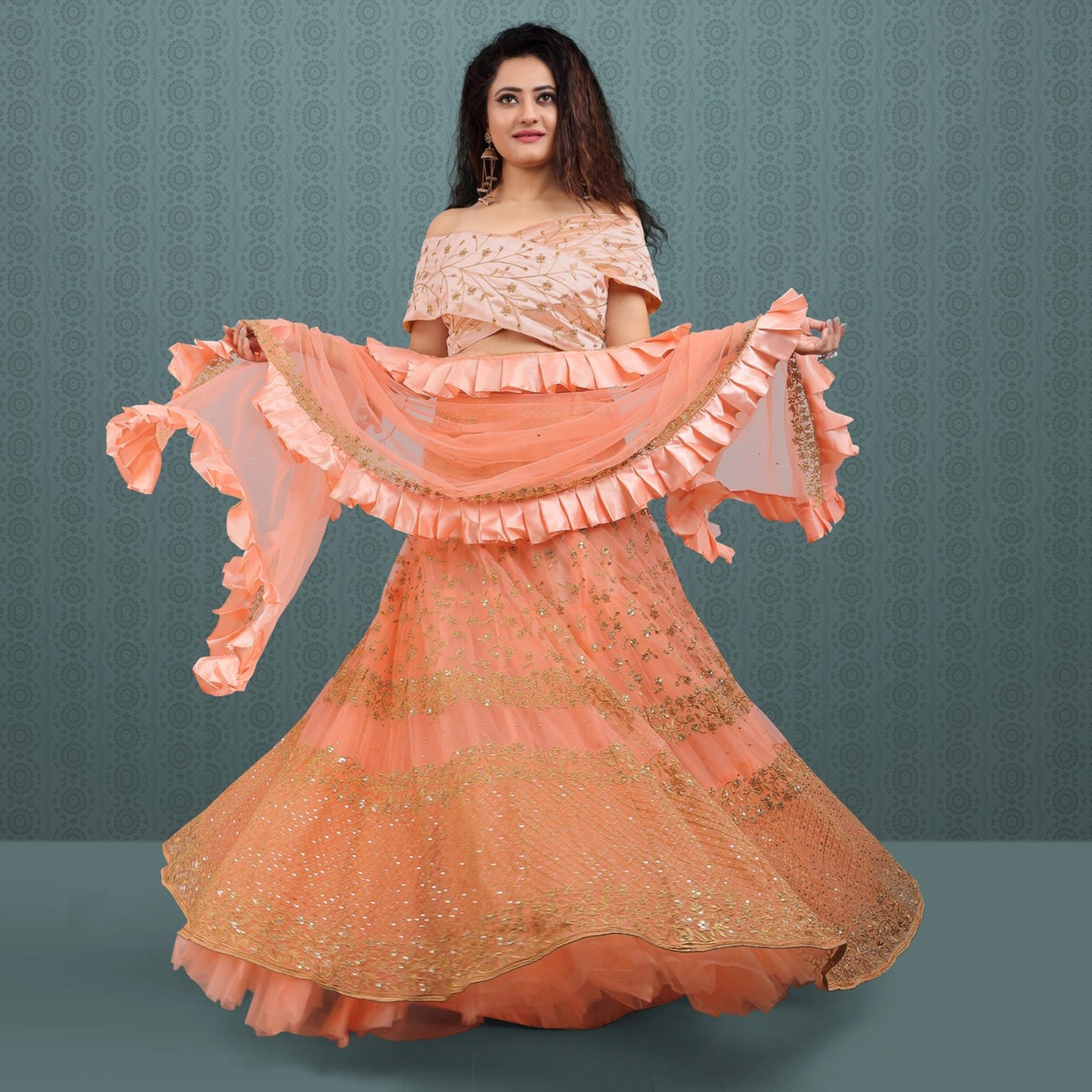 Peach Party Wear Sequins Embroidered Net Lehenga Choli