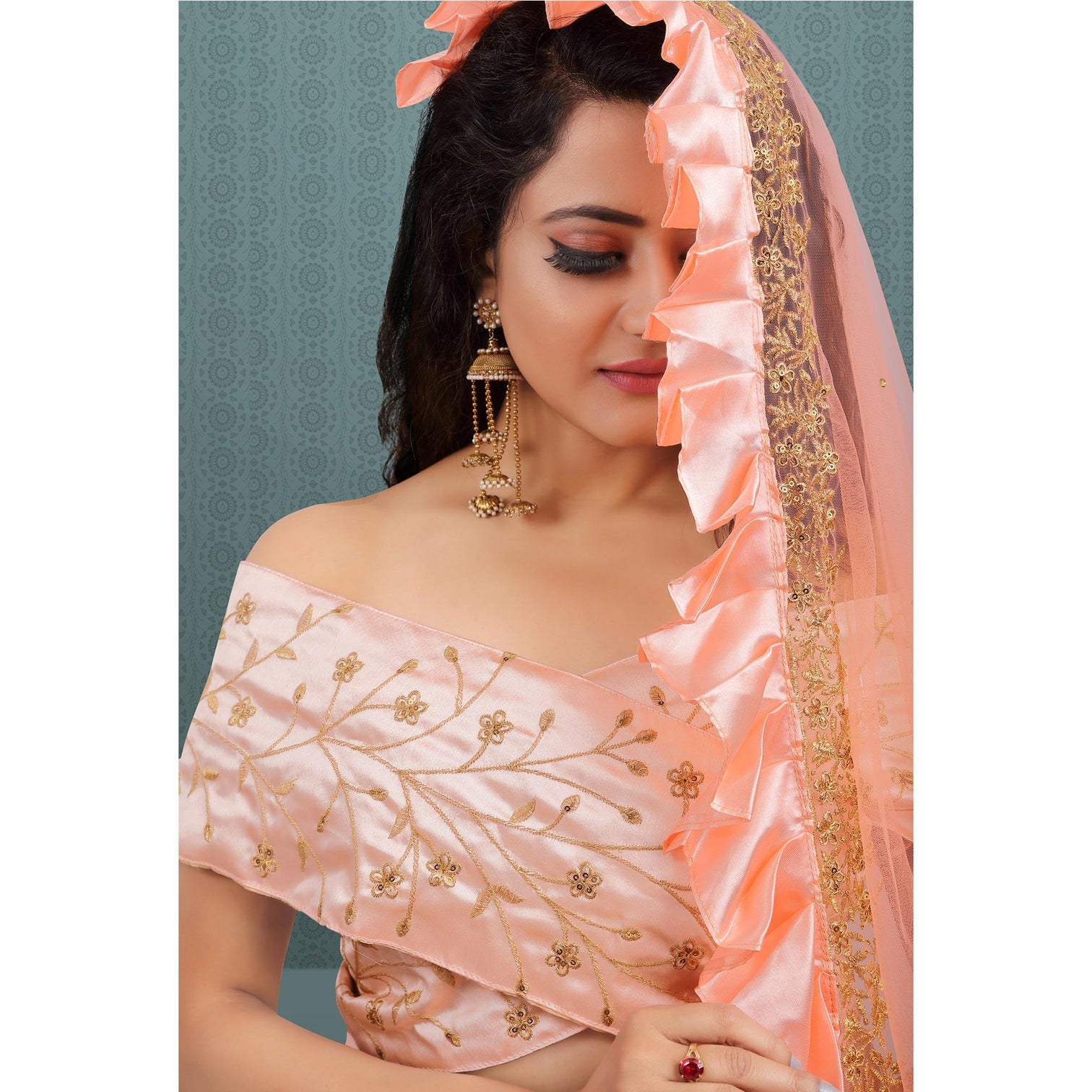 Peach Party Wear Sequins Embroidered Net Lehenga Choli