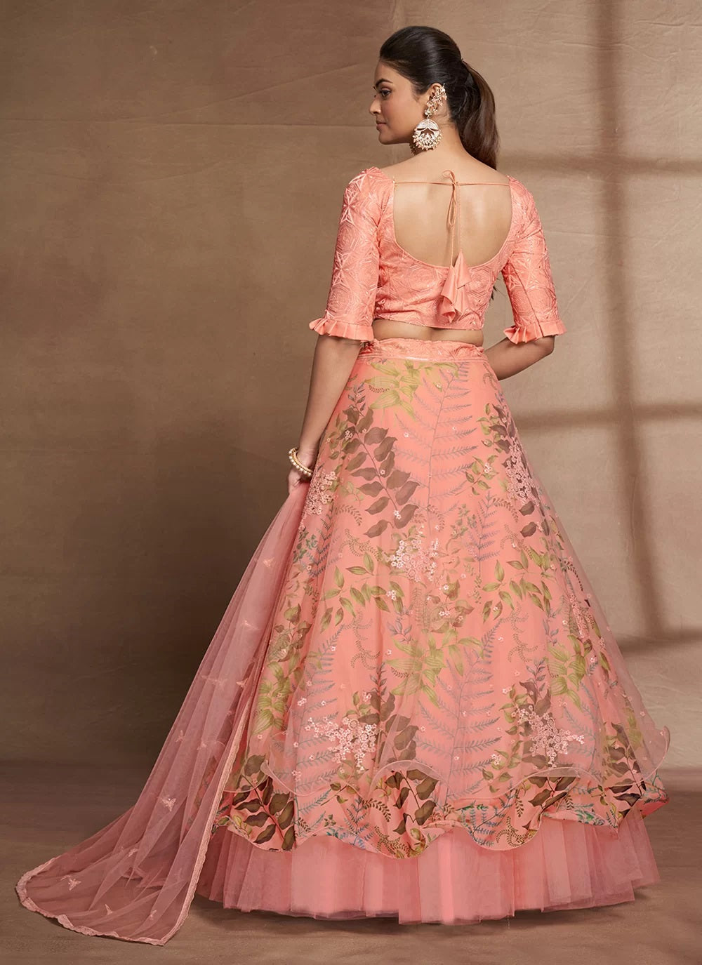 Peach sequins embroidered organza and net lehenga choli