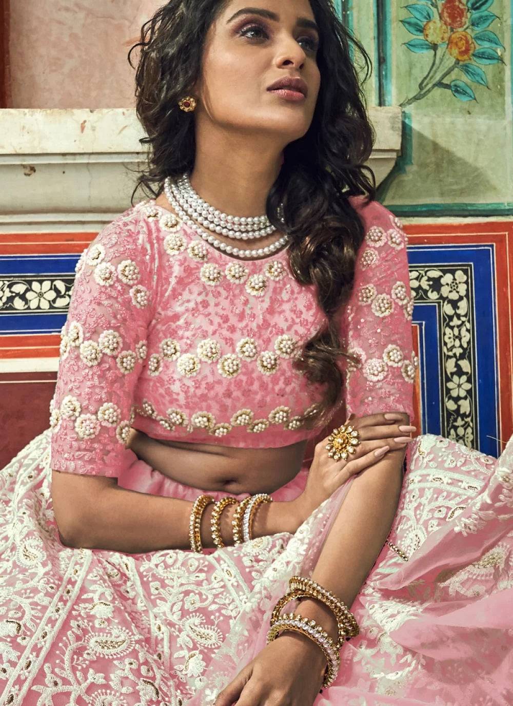Peach soft net lehenga with designer blouse