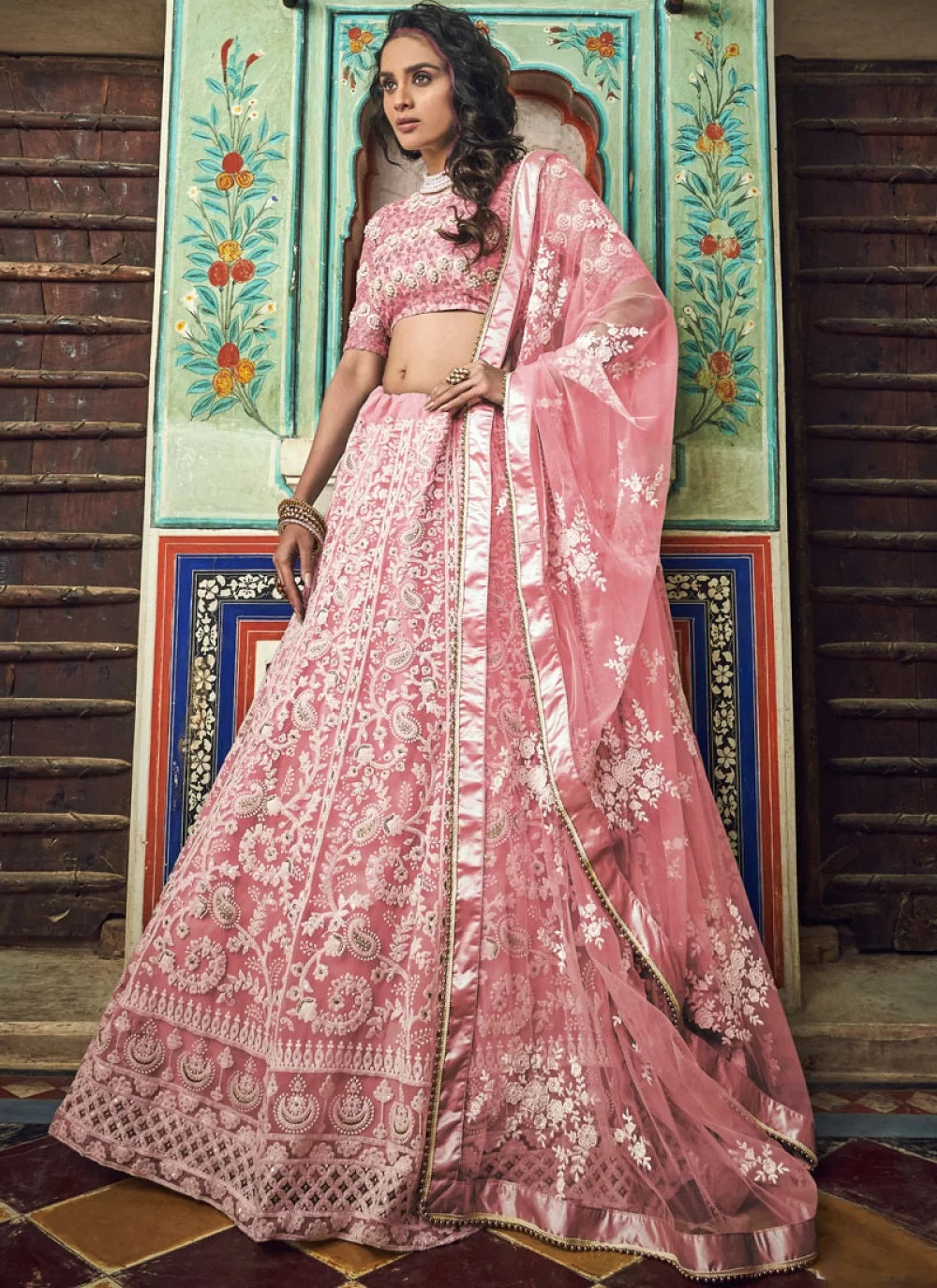 Peach soft net lehenga with designer blouse