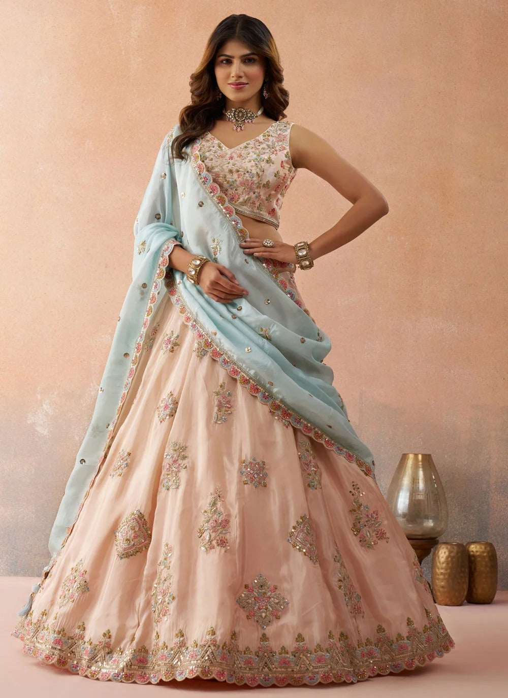 Peach tissue bridal lehenga set with sequins and zari embroidery