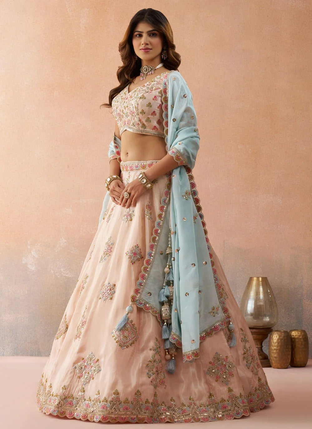 Peach tissue bridal lehenga set with sequins and zari embroidery