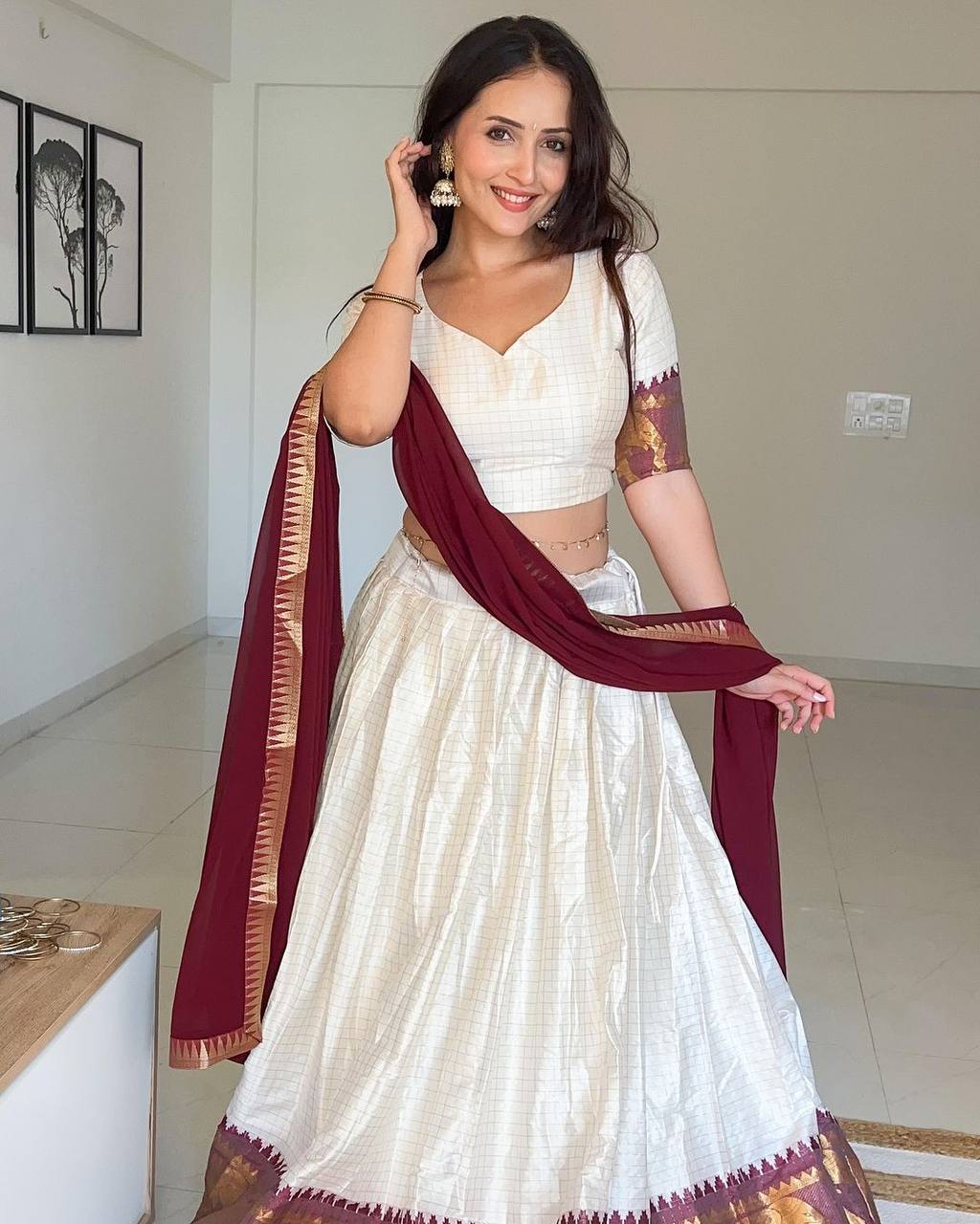Elegant elephant white checks silk lehenga light shades to complement to create beautiful aura in all function mameraa