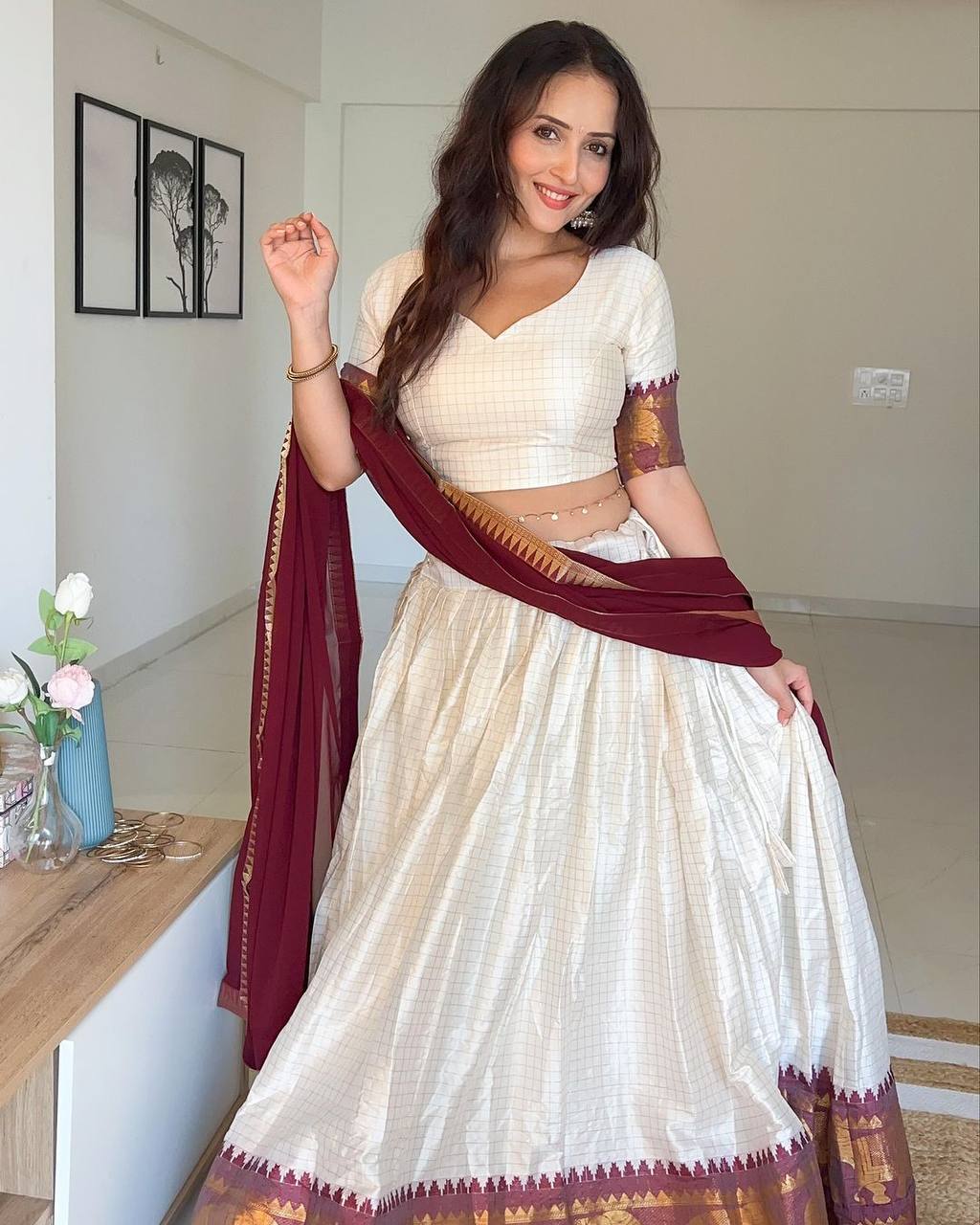Elegant elephant white checks silk lehenga light shades to complement to create beautiful aura in all function