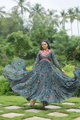 Green Elegant Bandhani Print Gown with Kutchi Patchwork in Faux Georgette