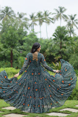 Green Elegant Bandhani Print Gown with Kutchi Patchwork in Faux Georgette