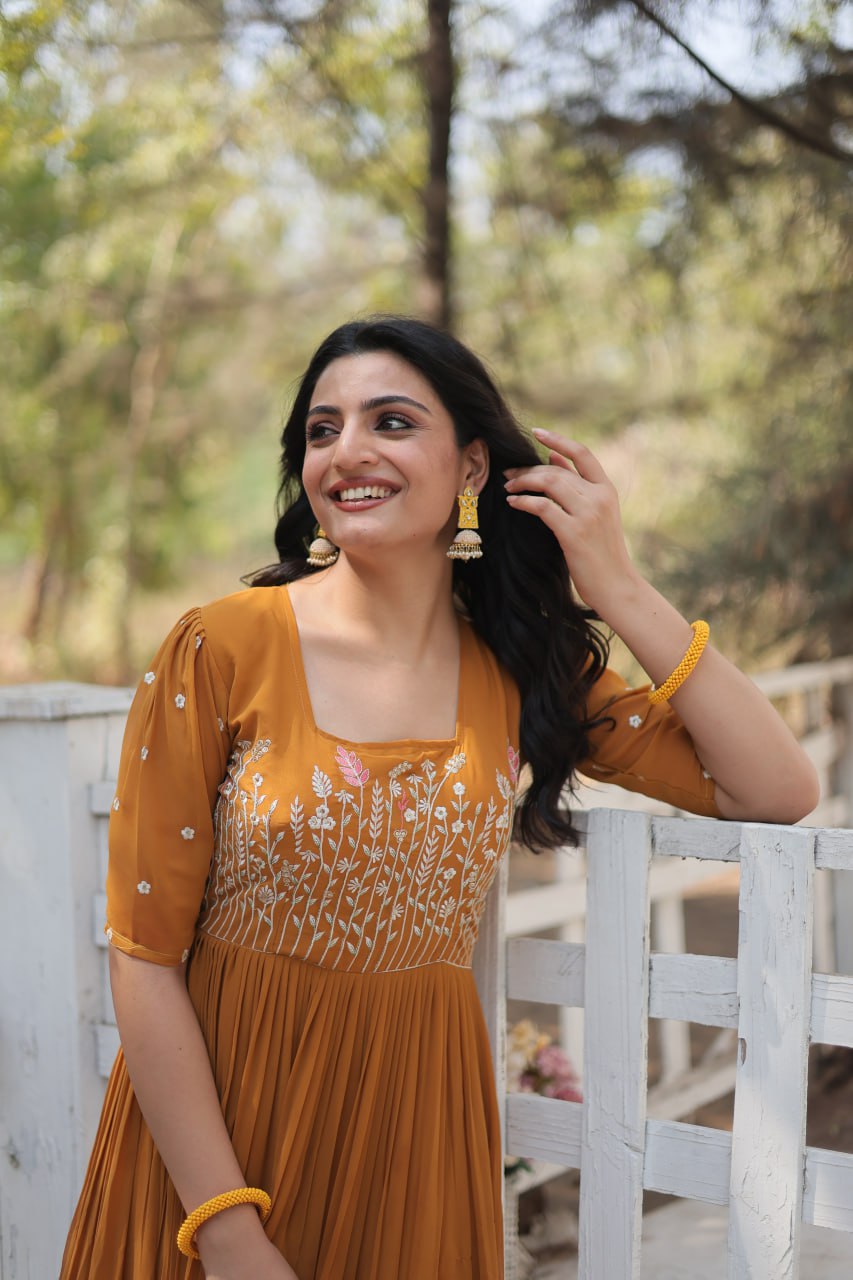 Yellow Elegant Faux Georgette Gown with Multithreaded Embroidery & Sequins