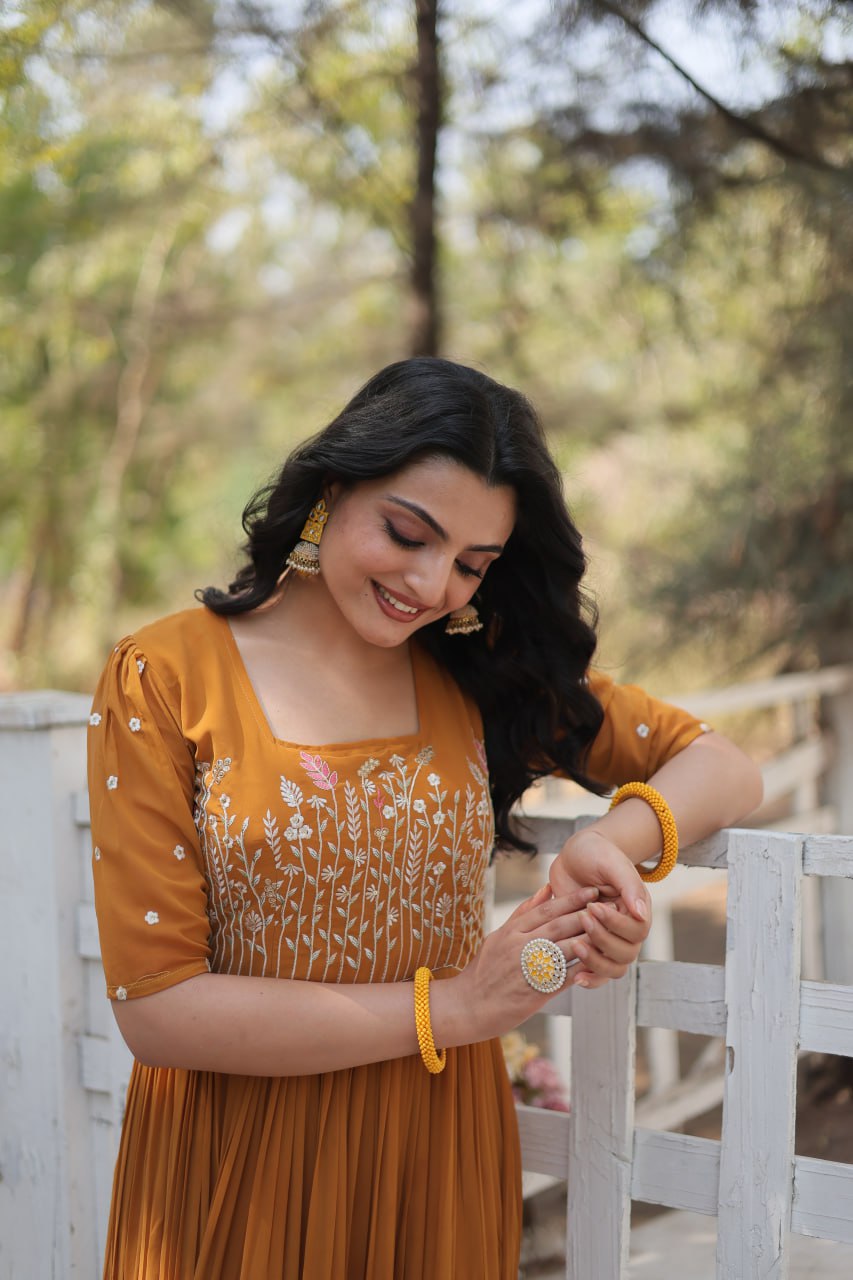 Yellow Elegant Faux Georgette Gown with Multithreaded Embroidery & Sequins