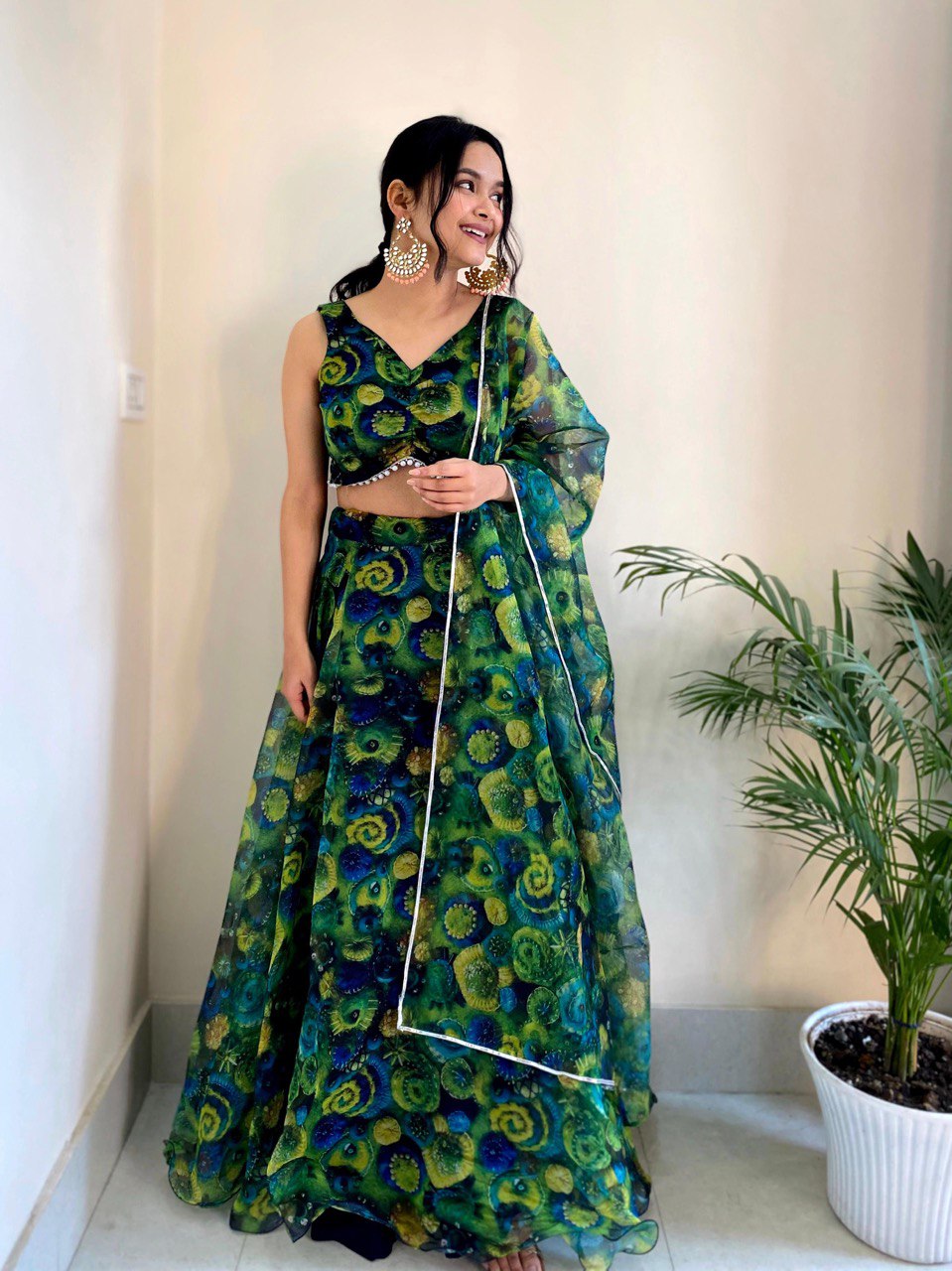 Green Exude Elegance with Our Exclusive Organza Lehenga Set