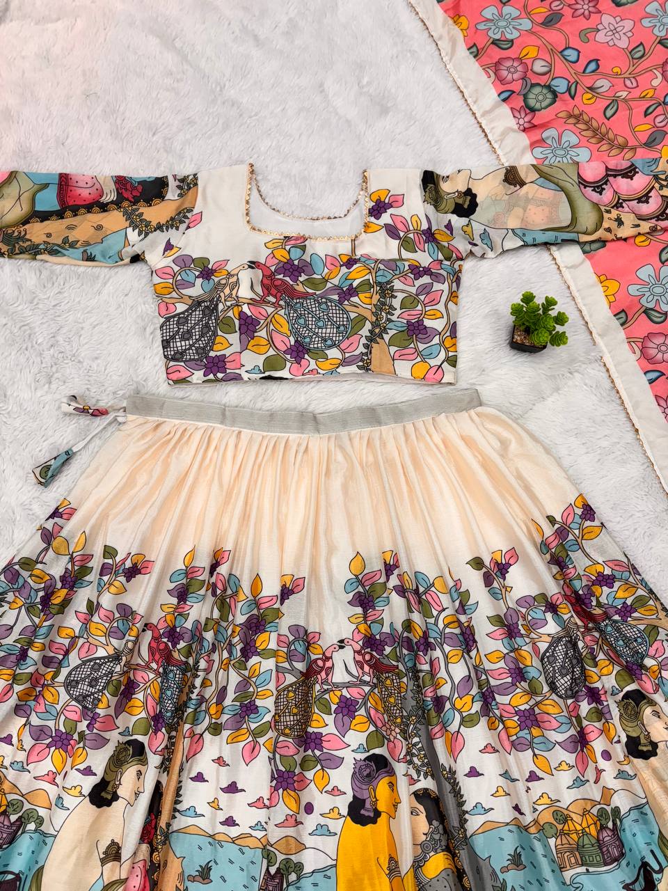 Kalamkari lehenga with vibrant mythological artwork ideal for weddings special occasions