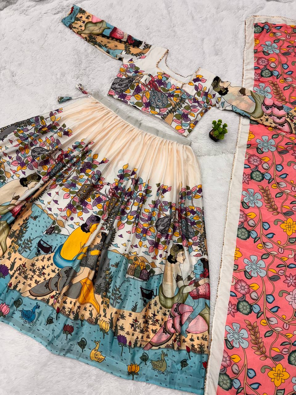 Kalamkari lehenga with vibrant mythological artwork ideal for weddings special occasions