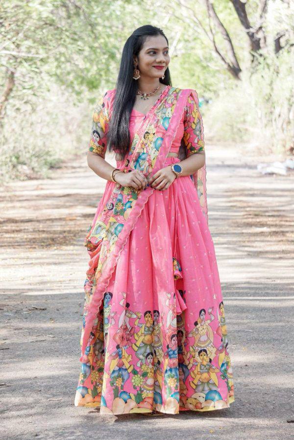 Bold red lehenga with vibrant folk dancer print and matching choli mameraa