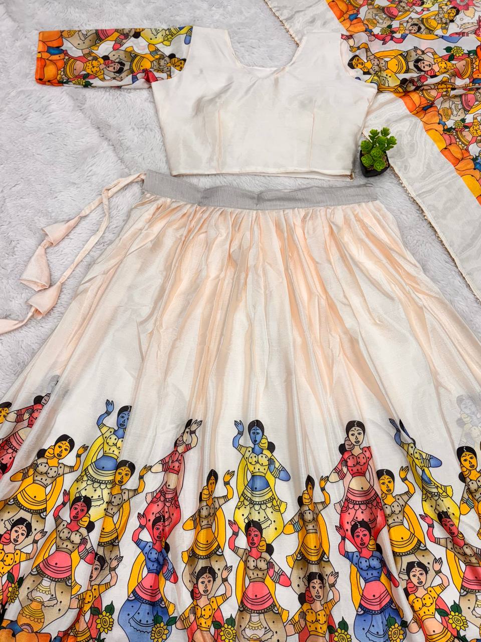 White lehenga with kalamkari art print perfect for festive style