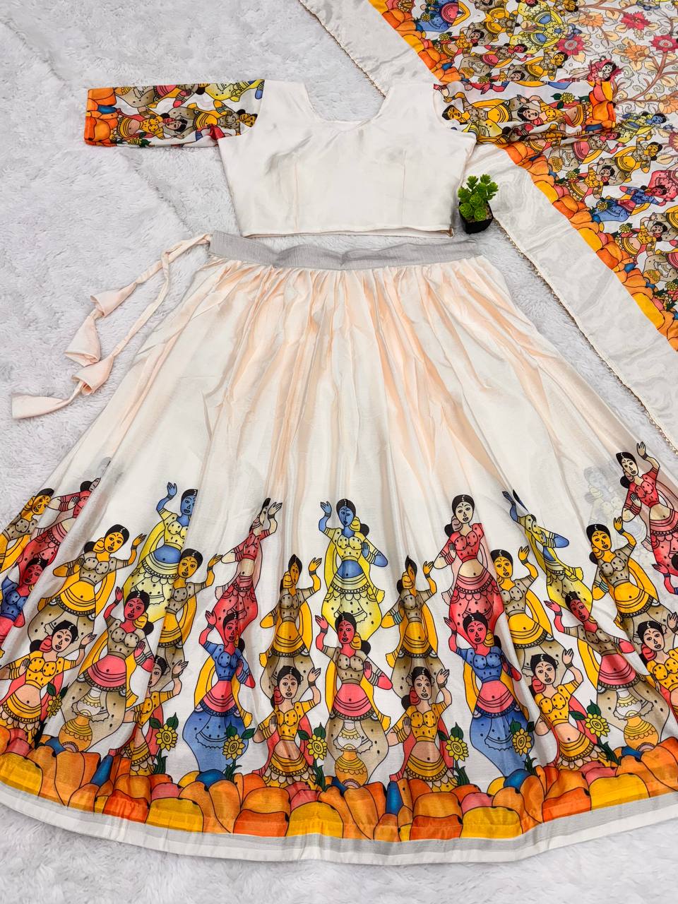 White lehenga with kalamkari art print perfect for festive style