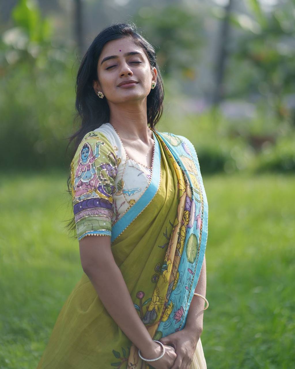 Classic lehenga choli featuring rich handcrafted kalamkari motifs