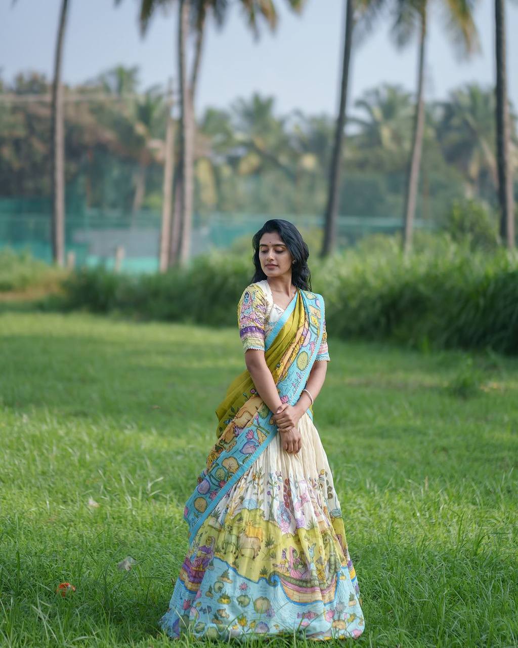 Classic lehenga choli featuring rich handcrafted kalamkari motifs