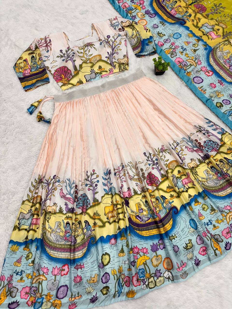 Classic lehenga choli featuring rich handcrafted kalamkari motifs