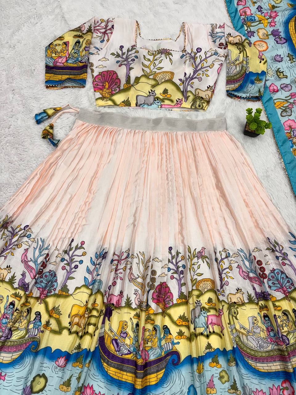 Classic lehenga choli featuring rich handcrafted kalamkari motifs