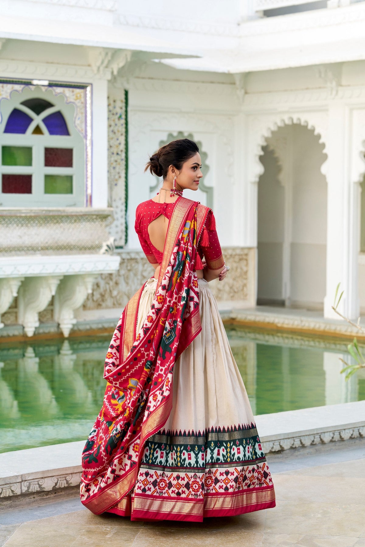 Mameraa Cream Patola Lehenga Choli with Red Banarasi Dupatta