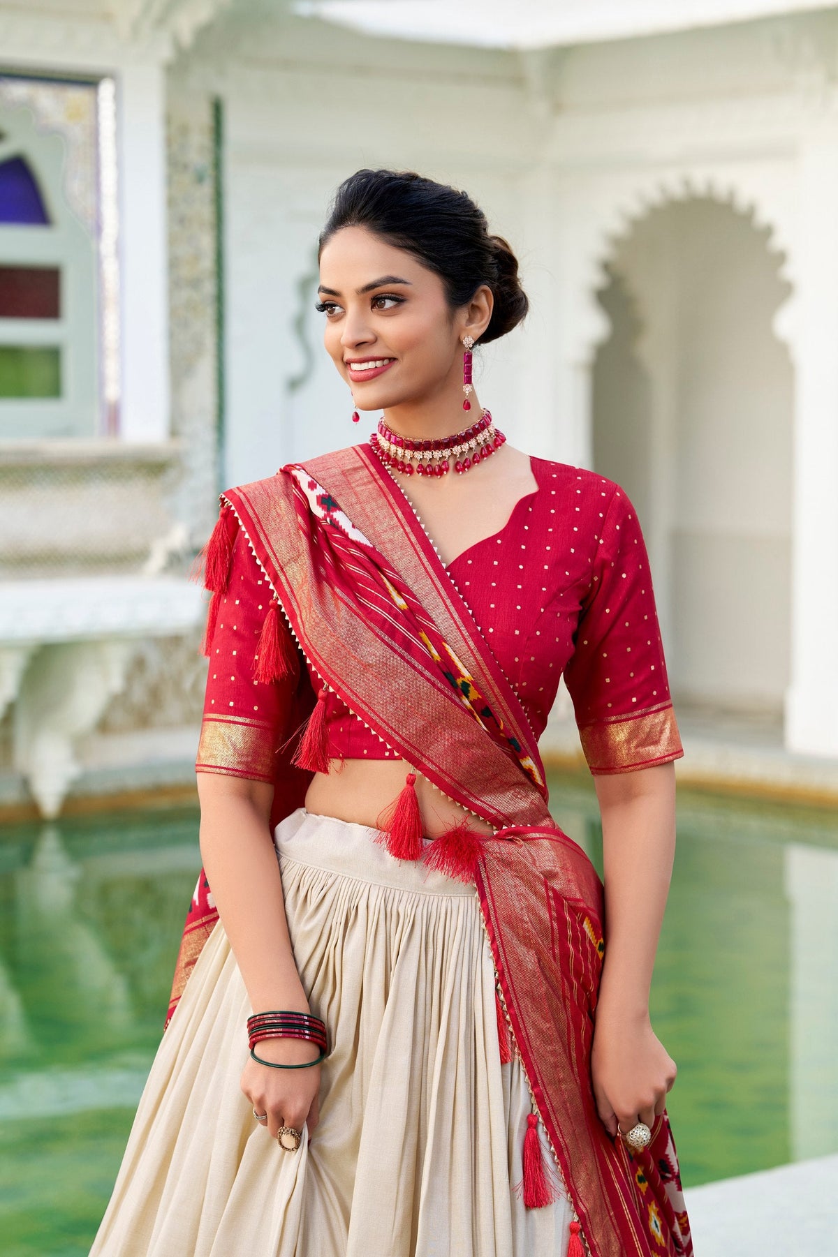 Mameraa Cream Patola Lehenga Choli with Red Banarasi Dupatta