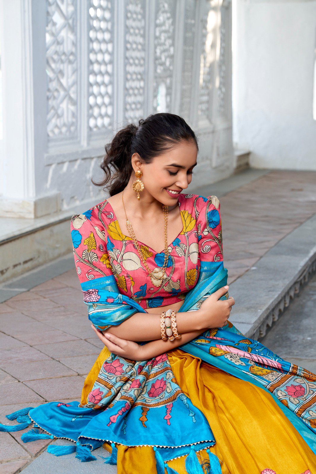Glamgait Mustard Yellow Floral Lehenga Choli with Blue Silk Dupatta