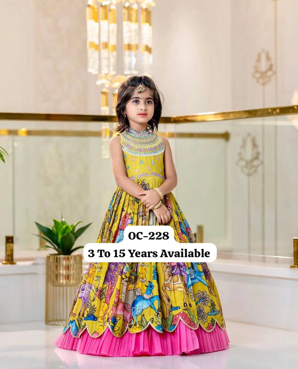 Girls Premium Yellow Printed Ethnic Gown with Pink Pleated Flair