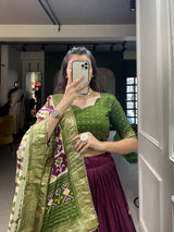 Mameraa Wine & Olive Green Patola Lehenga Choli with Banarasi Border & Printed Dupatta