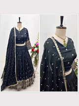 Elegant Black Silk Lehenga Choli with Heavy Gold Embroidered Border & Dupatta