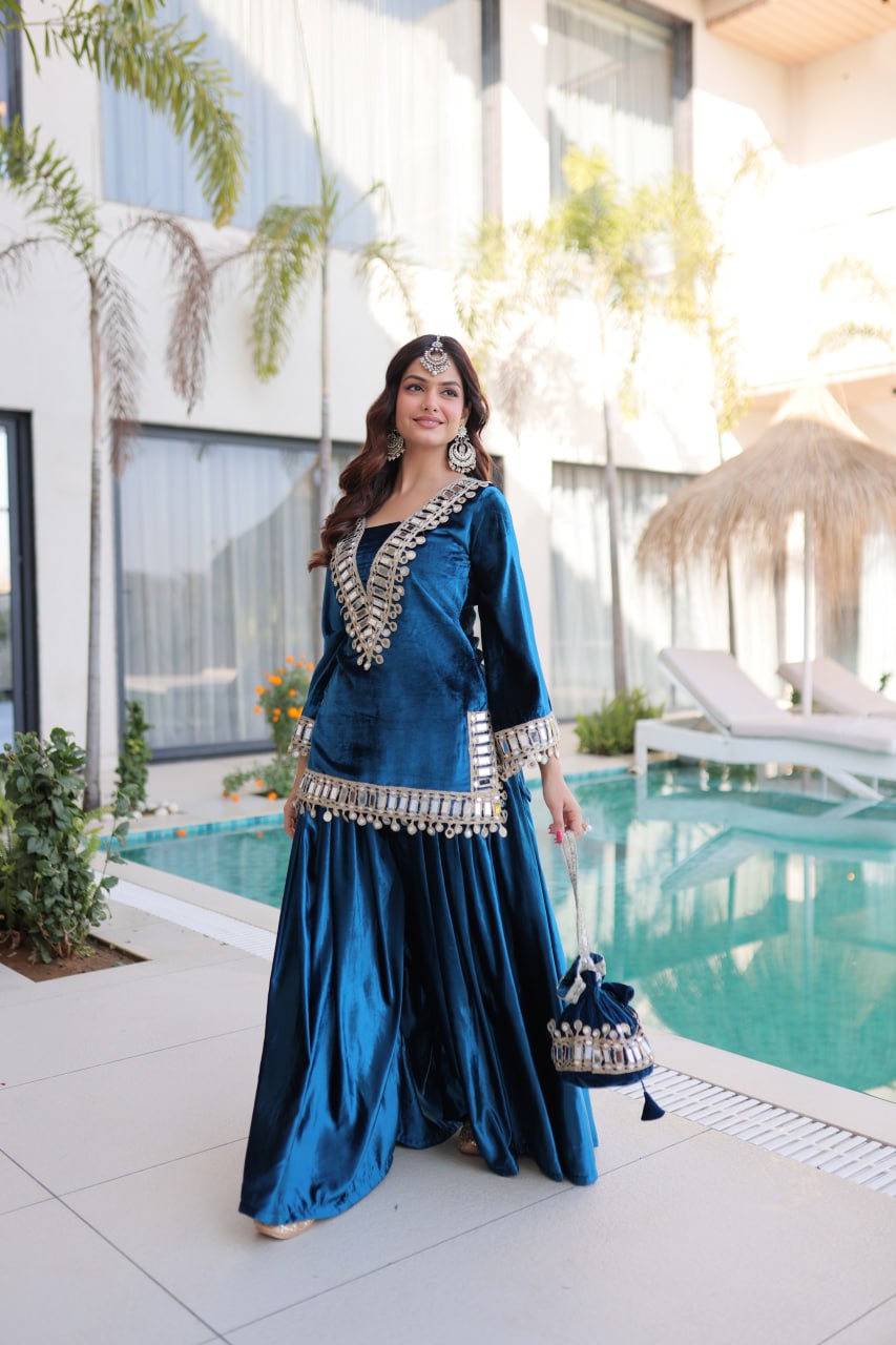 Teal blue ice velvet zari mirror work top with flared palazzo set