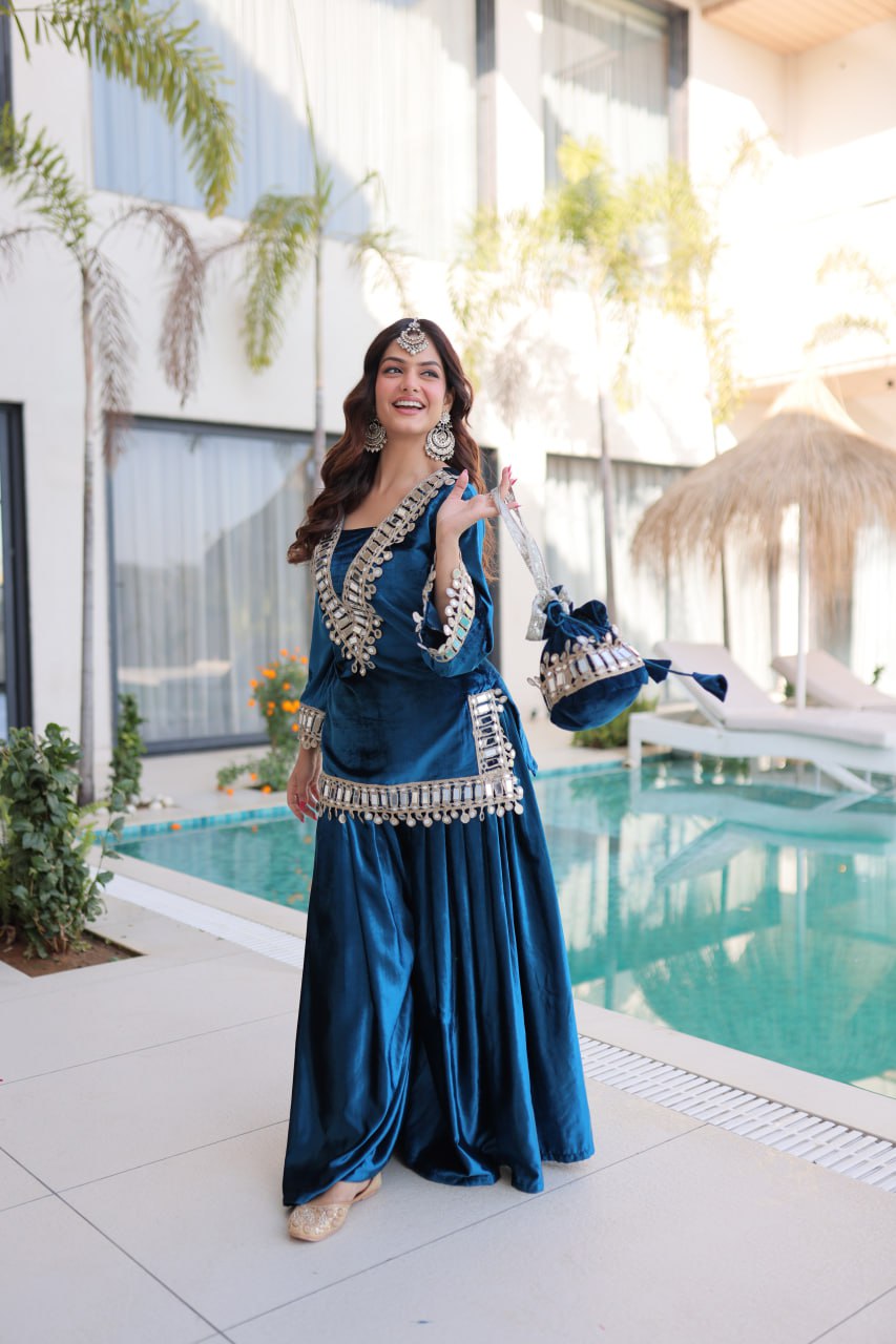 Teal blue ice velvet zari mirror work top with flared palazzo set