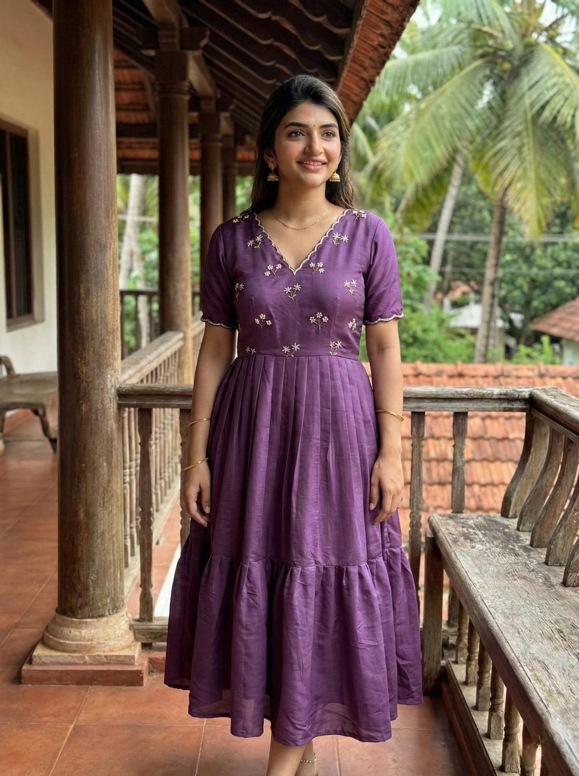 Wine purple designer ethnic gown for women with moti kardana hand embroidery mameraa
