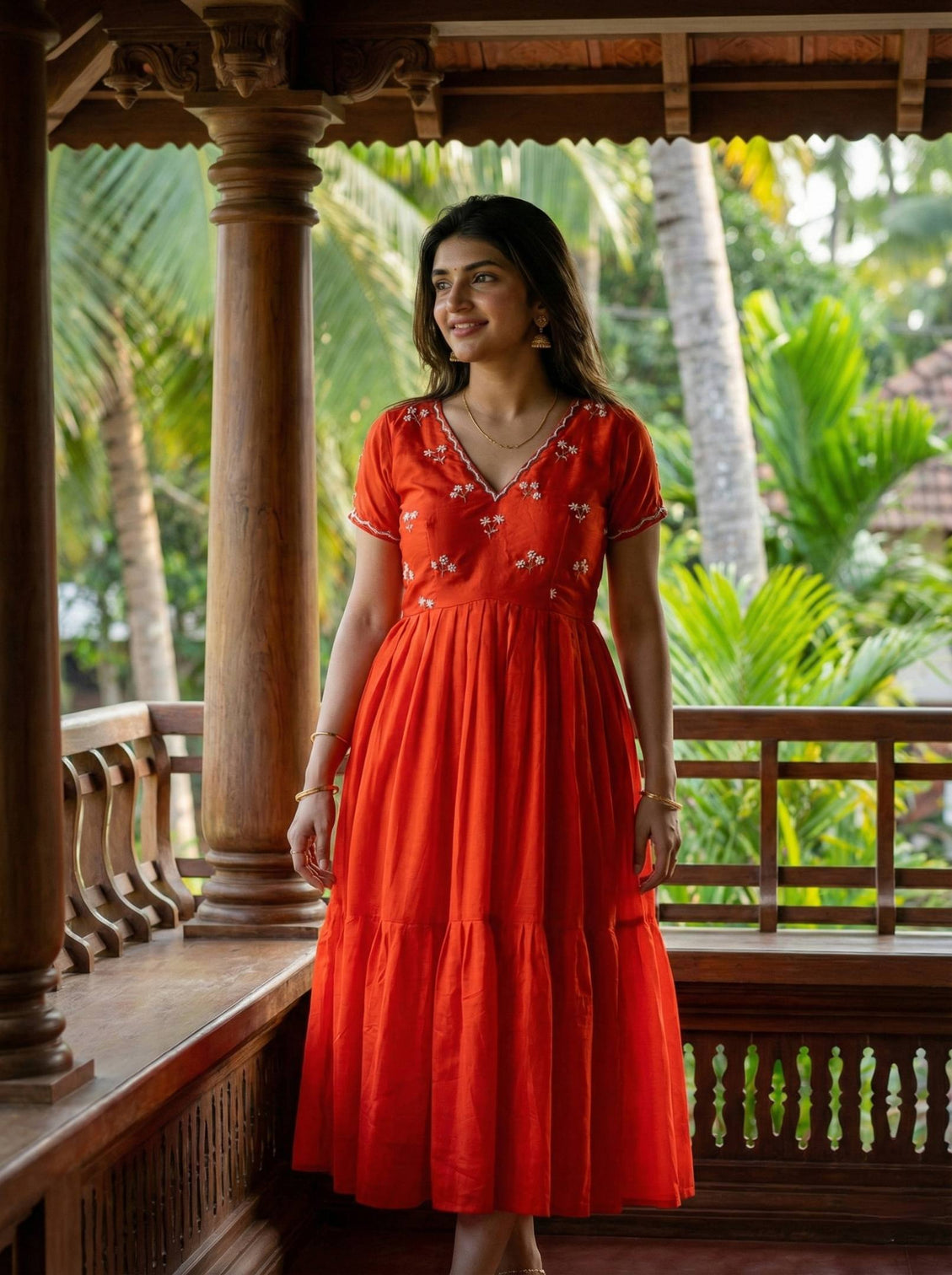 Designer red ethnic gown for women with moti kardana hand embroidery mameraa