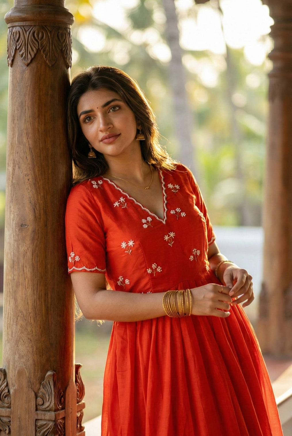 Designer red ethnic gown for women with moti kardana hand embroidery