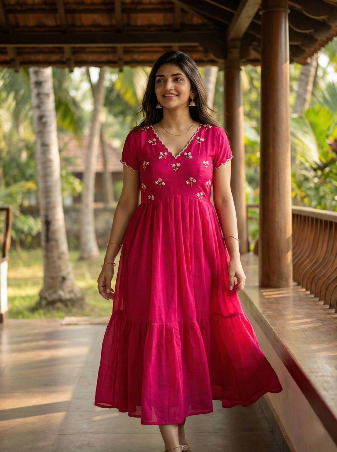 Designer rani pink ethnic gown for women with moti kardana hand embroidery mameraa
