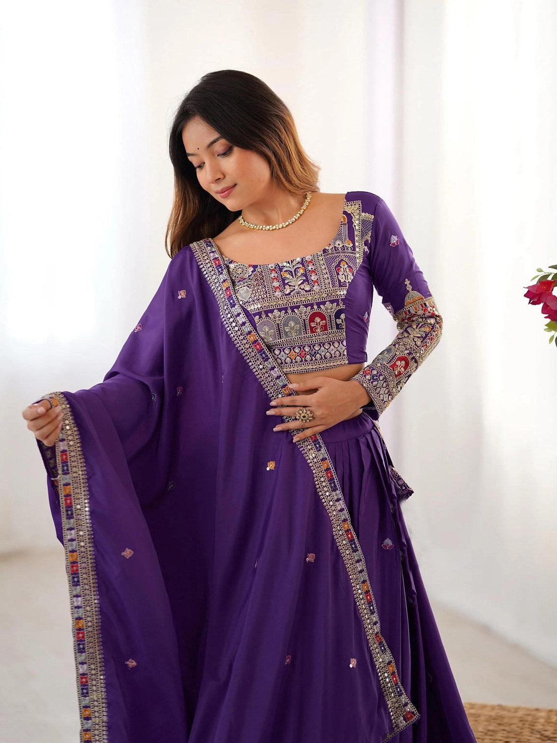 Royal Purple Embroidered Lehenga Choli with Heavy Traditional Border