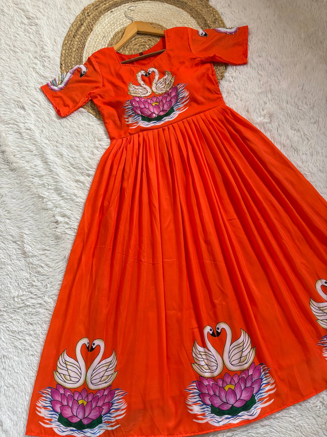 Radiant orange muslin gown with hand painted swan khatli art