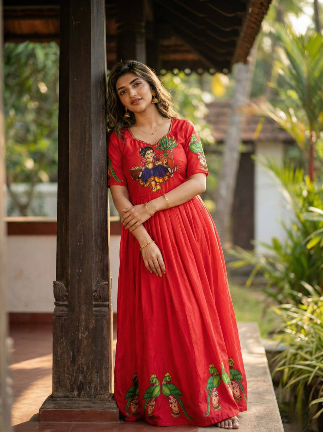 Red kalamkari printed maslin gown with khatli handwork moti beads