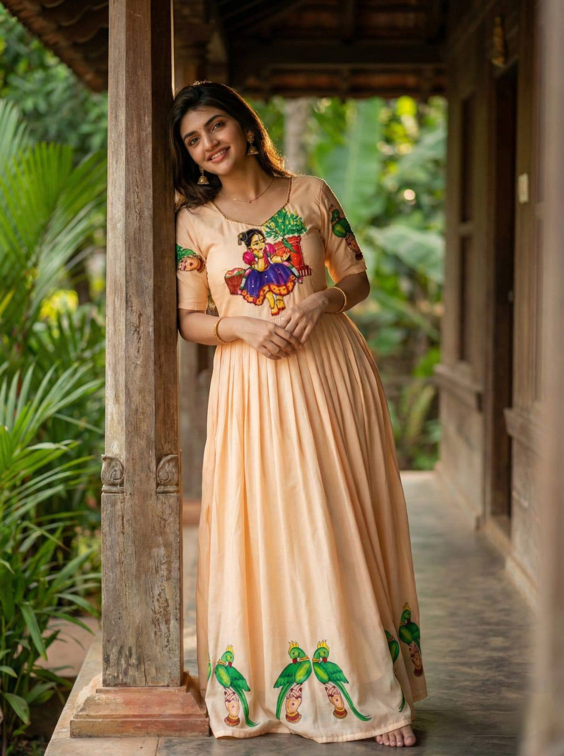 Peach kalamkari maslin gown with khatli handwork beads moti detailing