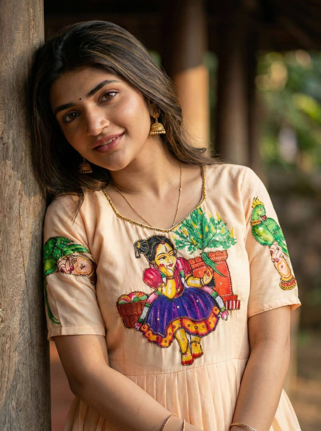 Peach kalamkari maslin gown with khatli handwork beads moti detailing