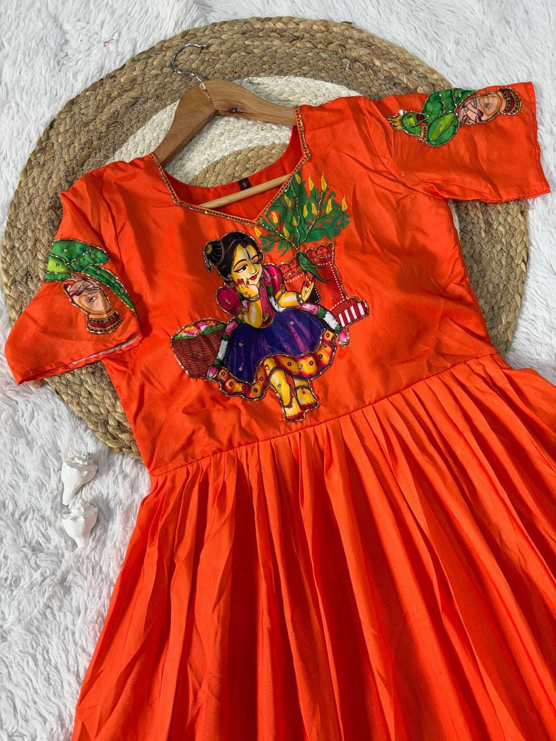 Orange kalamkari printed maslin gown with khatli handwork moti beads