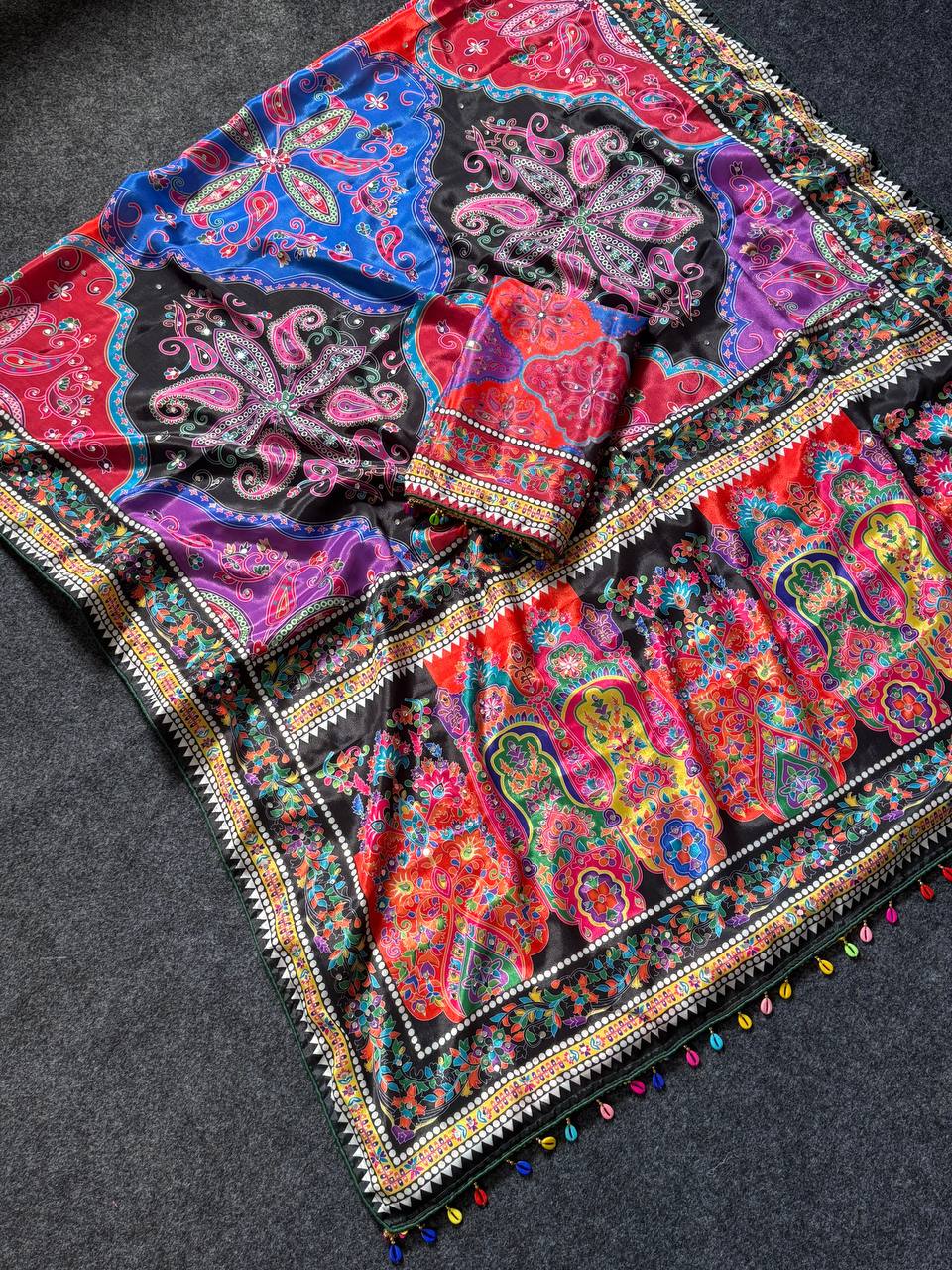 Vibrant paisley print saree with real mirror work