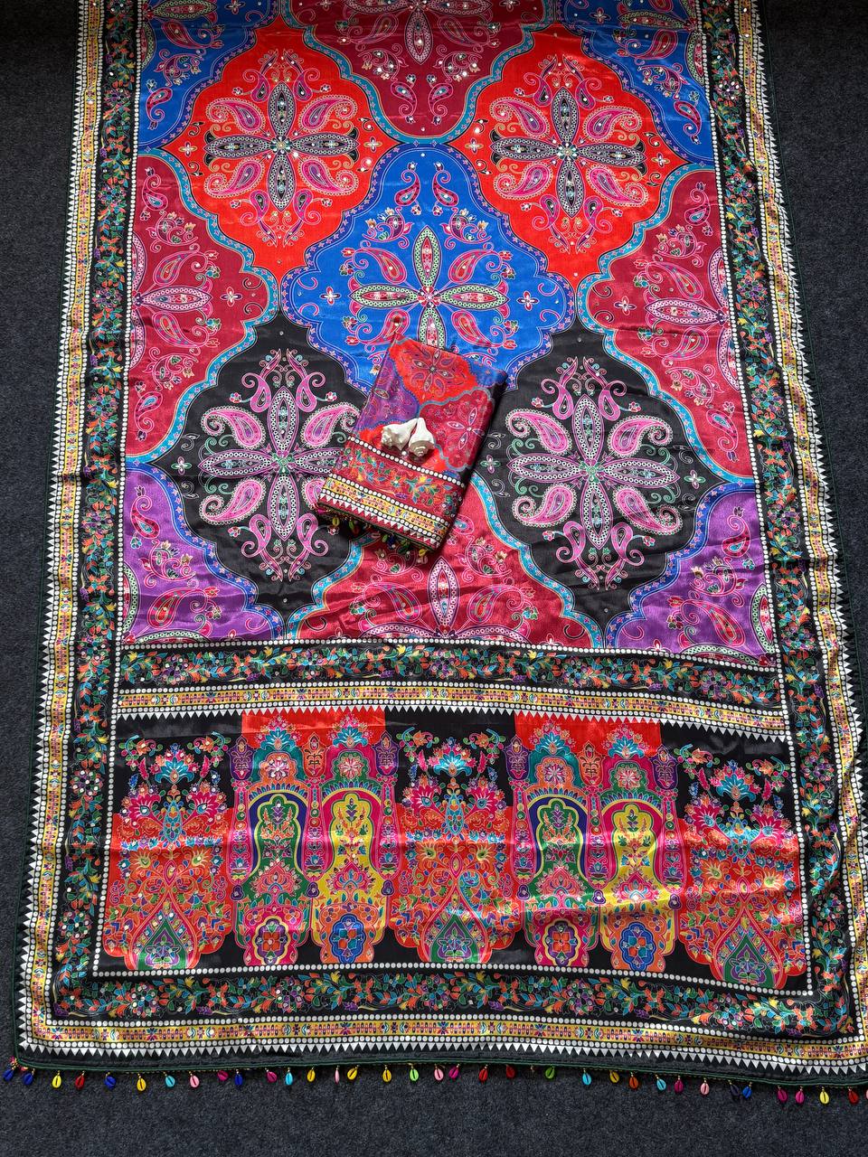 Vibrant paisley print saree with real mirror work