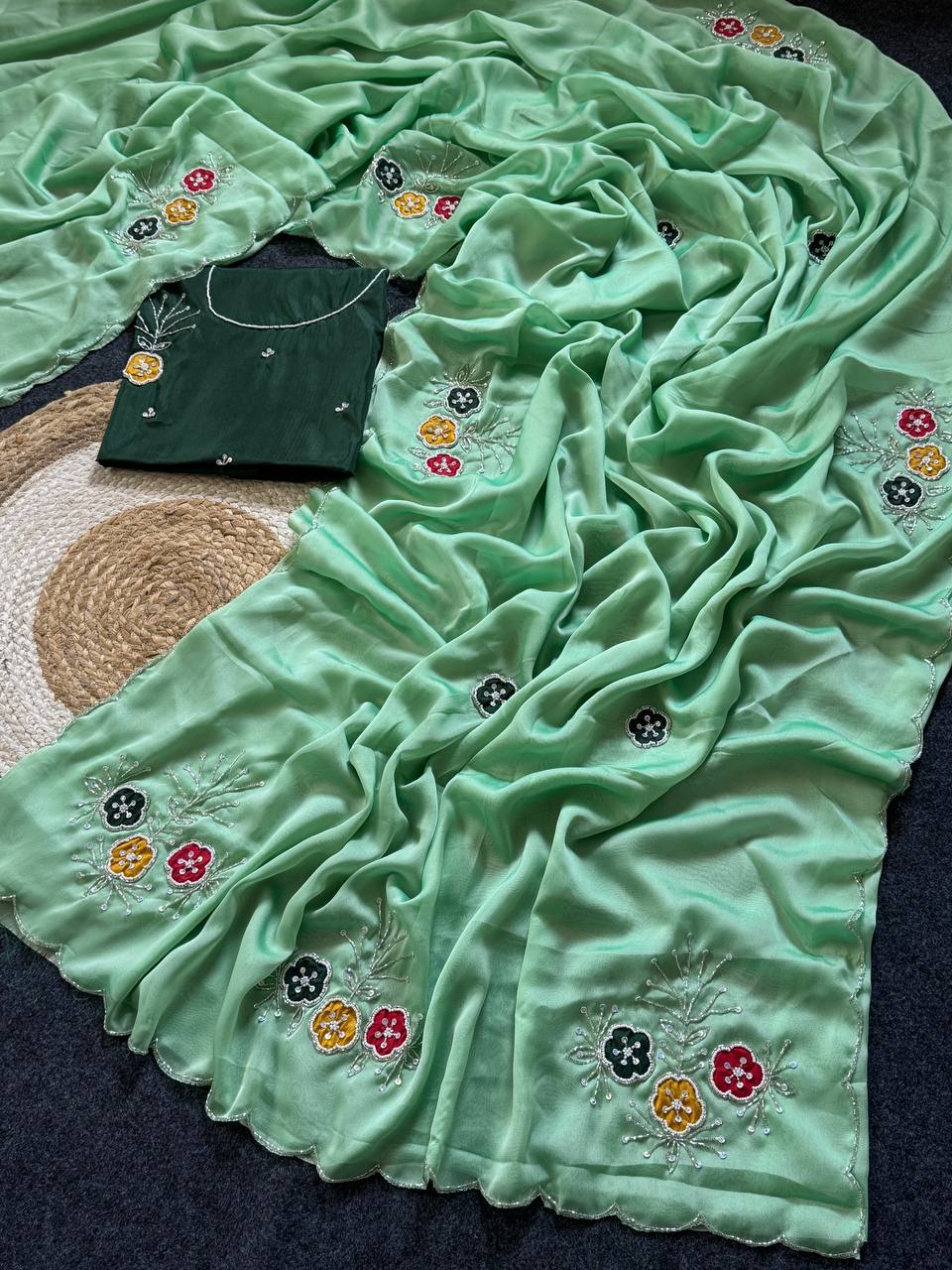 Graceful mint green soft rangoli saree with handwork floral butta